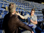 Shawn Boyd interviews at an N F L stadium