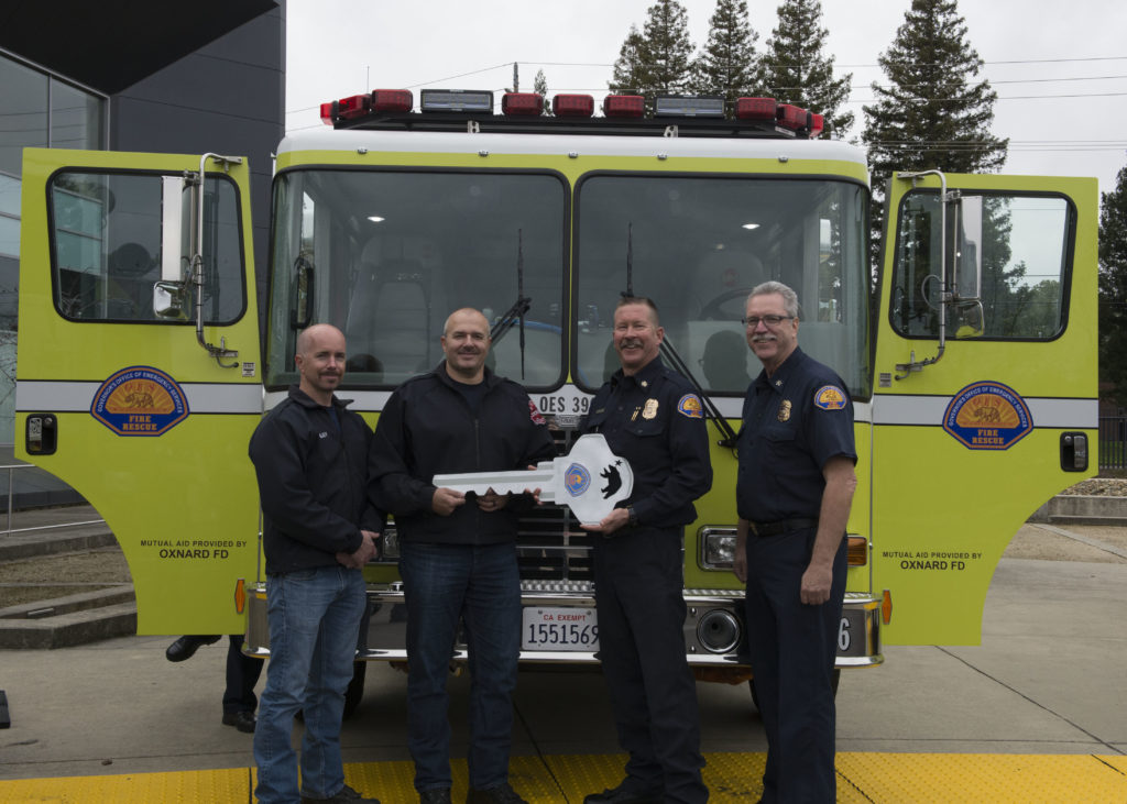 Chief Brian Marshall handing over new engine to Oxnard Fire Department