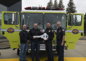 Chief Brian Marshall handing over new engine to Oxnard Fire Department
