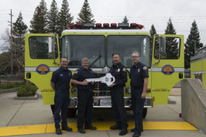Chief Brian Marshall handing over new engine to Ventura County