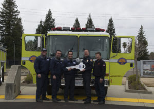 Chief Brian Marshall handing over new engine to Monterey Park Fire Department