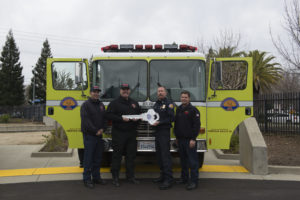 Chief Brian Marshall handing over new engine to Fountain Valley Fire Department