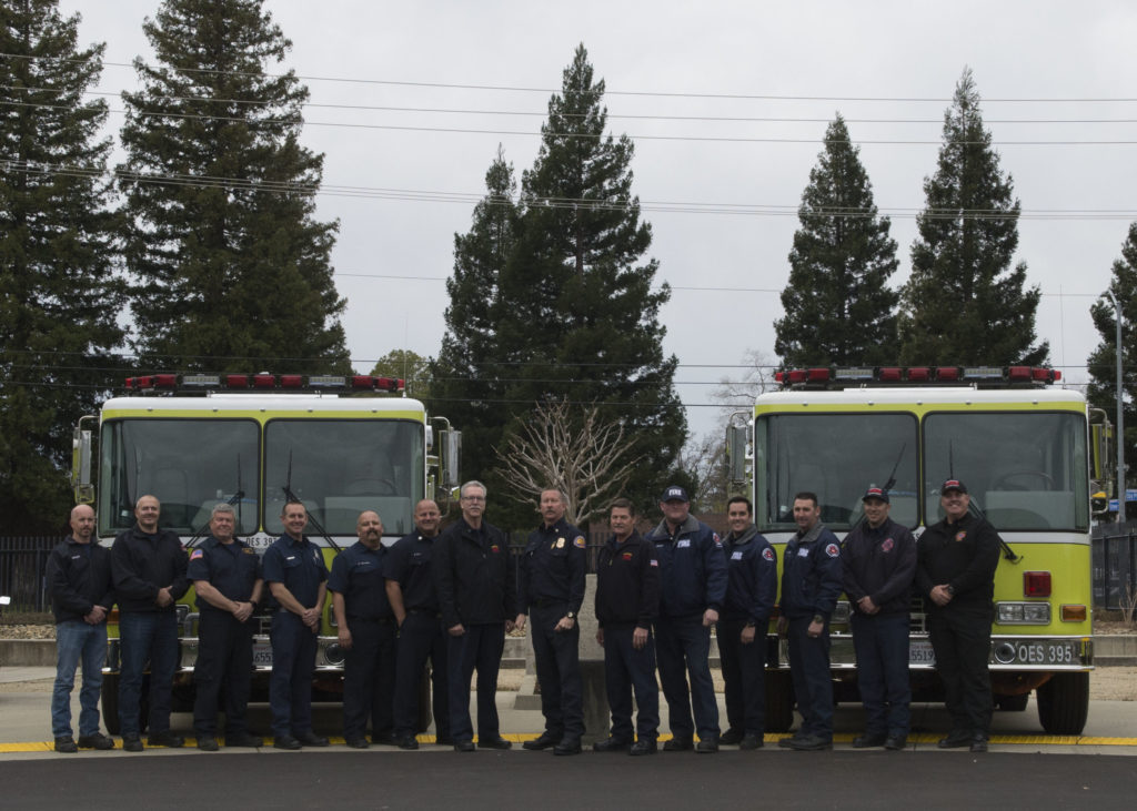 Chief Brian Marshall handing over new engines