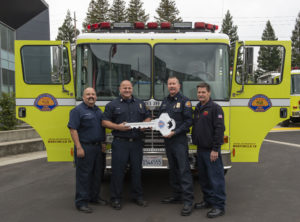 Chief Brian Marshall handing over new engine to Montebello Fire Department