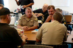 O E S Law Division Chief Paul Tassone attending a law enforcement briefing at the Tuolumne Memorial Hall in Tuolumne, California