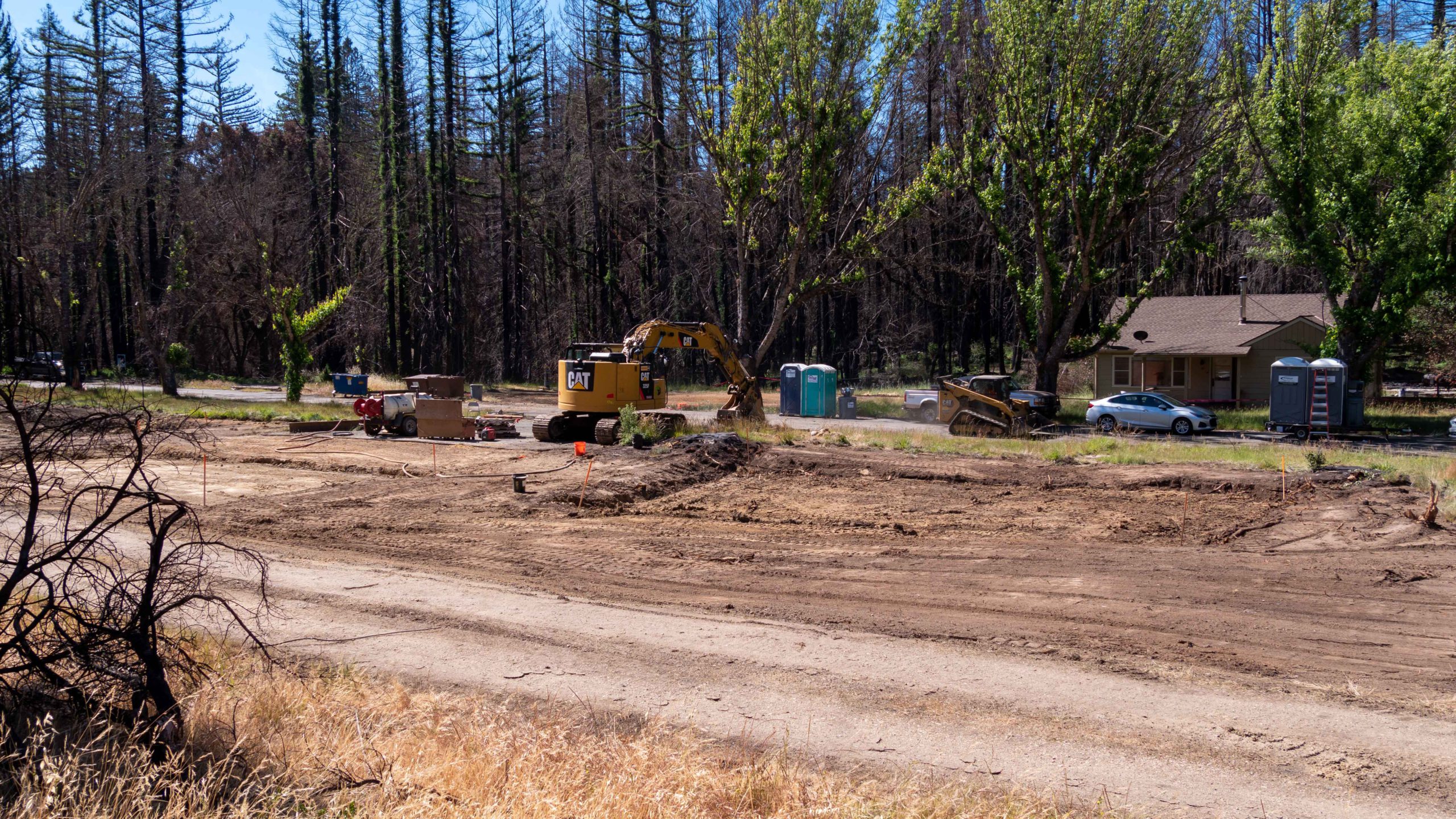 A lone park employee house survived fire.