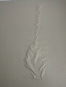 This photo shows what water damage can look like in your wall.